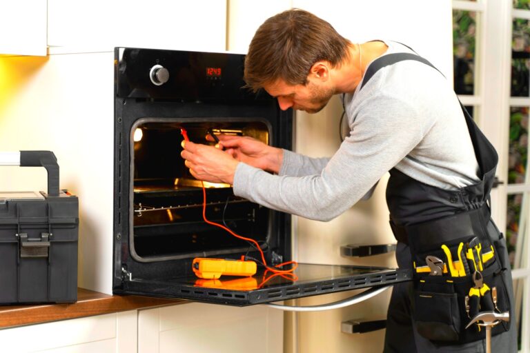 Man Repairing Oven Locally in Aurora, IL